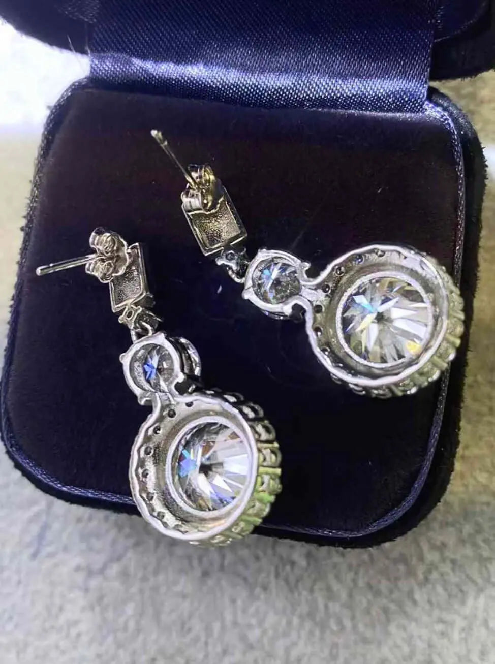 12 Carat Moissanite Platinum-Plated Drop Earrings-Flat Lay Style