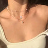 Silver and gold layered necklace